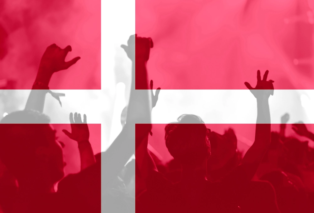 Danish football fans behind the Danish flag