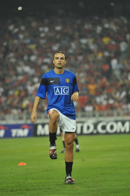 Berbatov in a blue Manchester United sweater